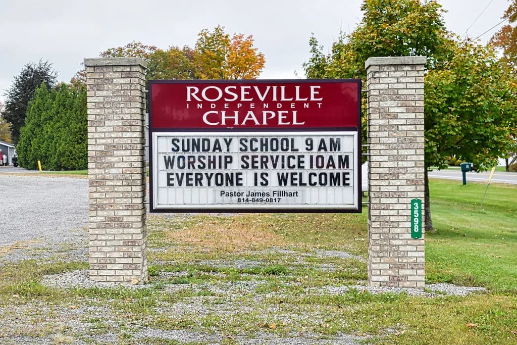 The Roseville Independent Chapel sign on Route 322: Sunday School 9 AM, Worship Service 10 AM, Everyone Is Welcome