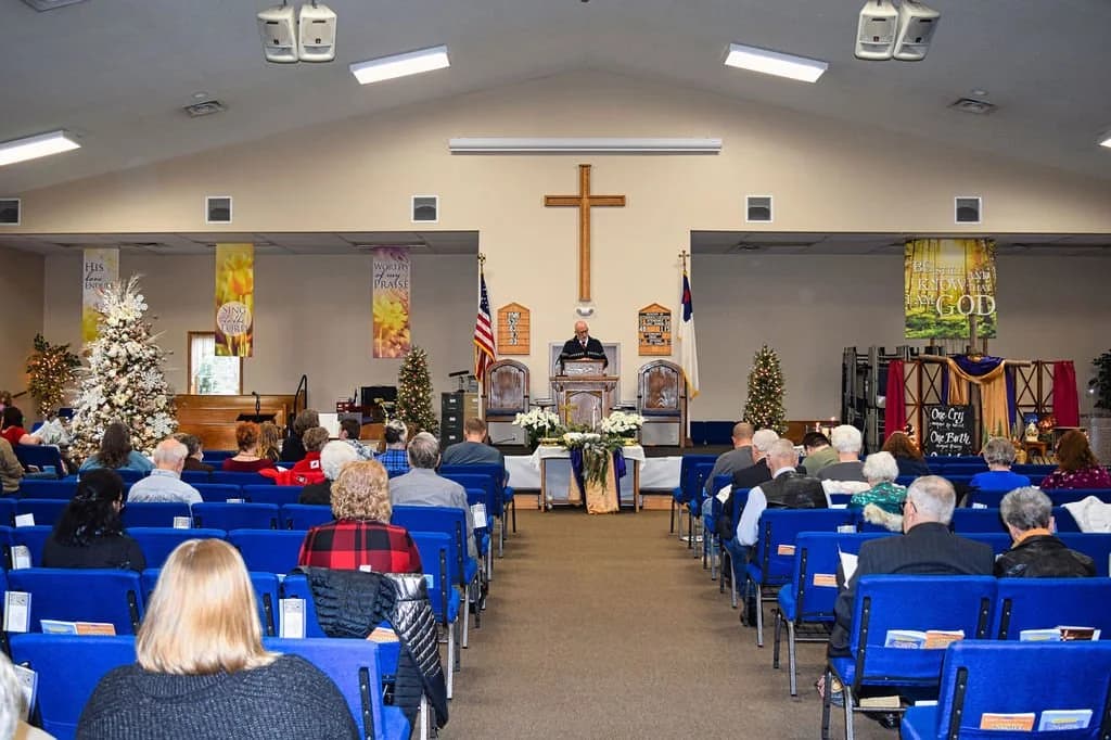 A Sunday morning service seen over the shoulders of the congregation