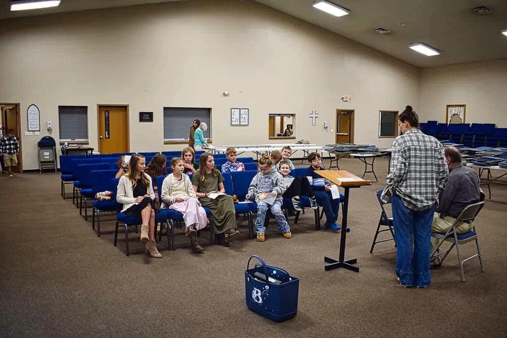 The youth class meeting in the fellowship hall
